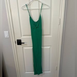 Gorgeous green midi dress with a tied front and crossed straps in the back